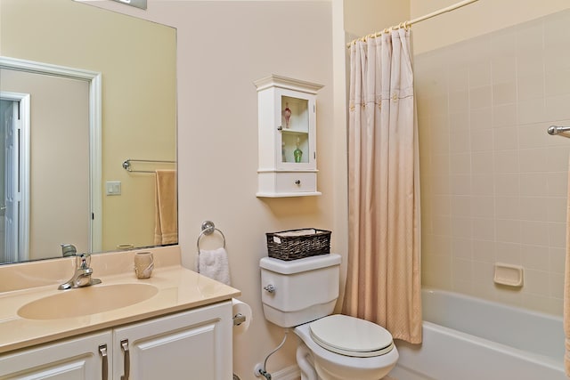 full bathroom with vanity, toilet, and shower / tub combo