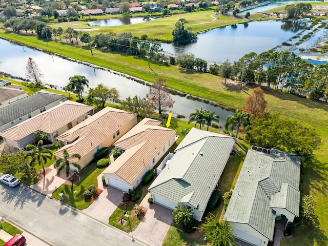 birds eye view of property featuring a water view