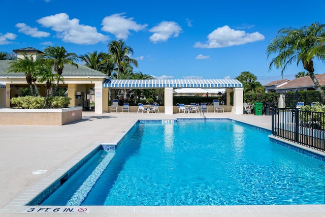 306 SW Tomoka Springs Dr, Port Saint Lucie, FL 34986 - pool featuring fence and a patio