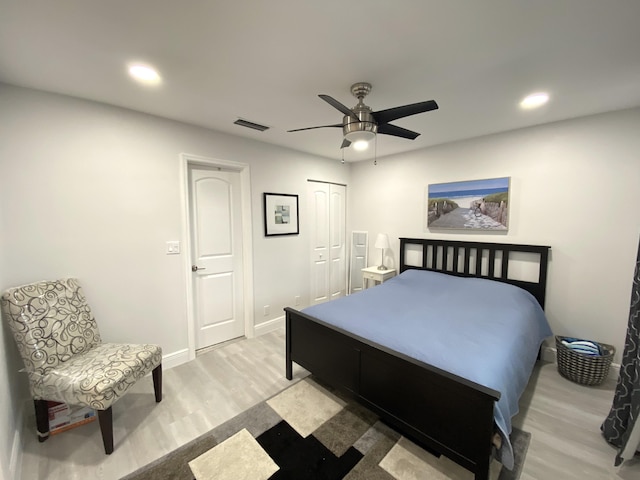 bedroom featuring ceiling fan and light wood-type flooring