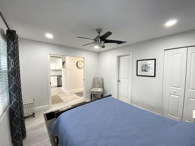 bedroom featuring ceiling fan and light hardwood / wood-style floors