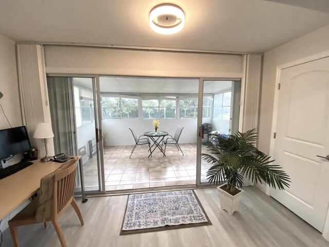 dining room featuring light hardwood / wood-style floors and sink