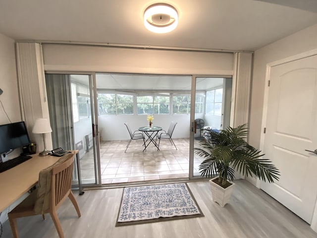 doorway to outside with light hardwood / wood-style flooring