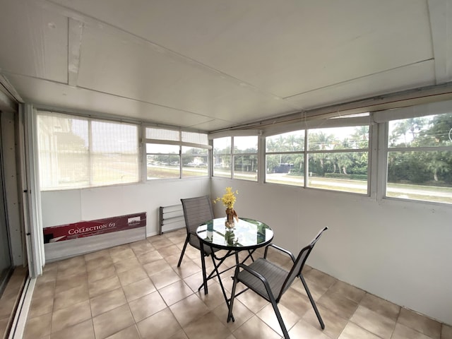 sunroom / solarium featuring a wealth of natural light