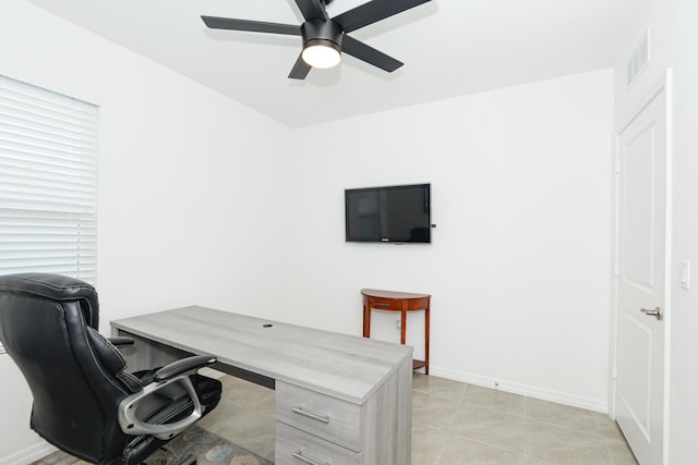 tiled office with ceiling fan