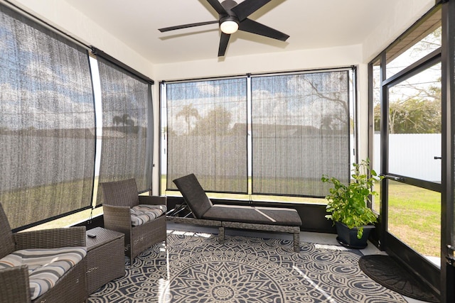 sunroom / solarium with ceiling fan