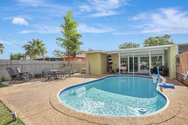 view of pool with a patio area