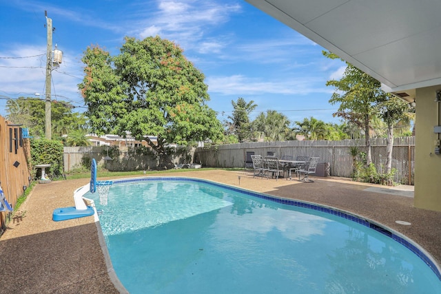 view of pool featuring a patio