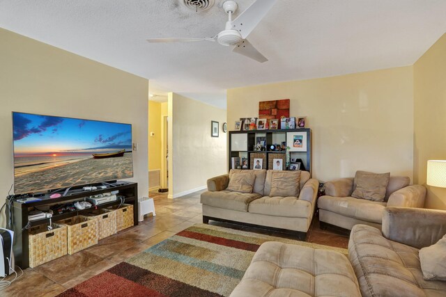 living room with ceiling fan