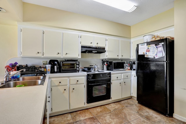 kitchen with white cabinetry, sink, and black appliances