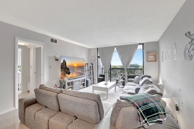 living room with a textured ceiling