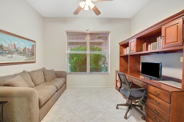 office area with ceiling fan and light tile patterned floors