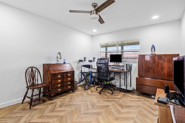 office featuring ceiling fan and light parquet flooring