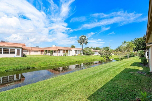 view of yard featuring a water view