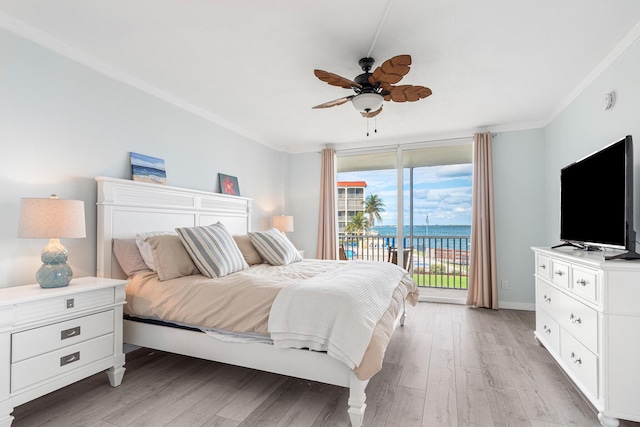 bedroom featuring crown molding, light hardwood / wood-style floors, ceiling fan, and access to outside