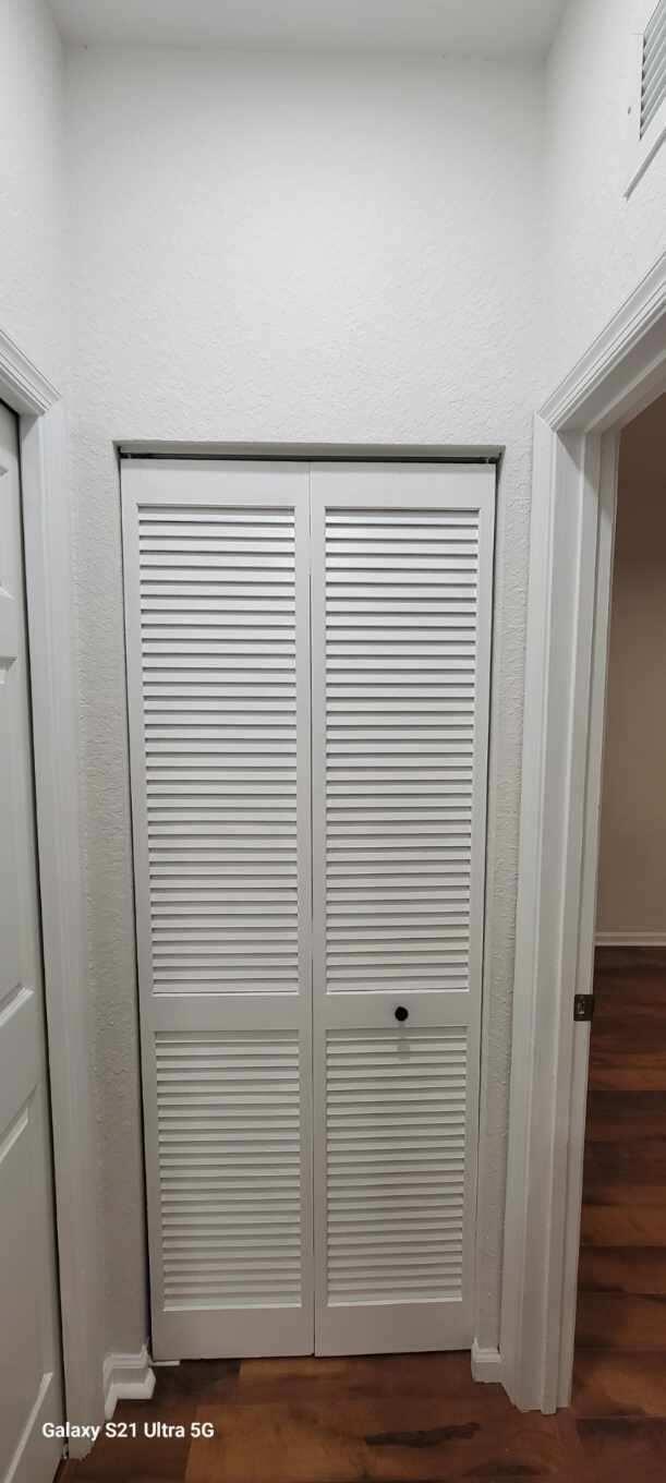 3569 Forest Hill Blvd Unit 103, Palm Springs, FL 33406 - room details featuring wood finished floors and visible vents