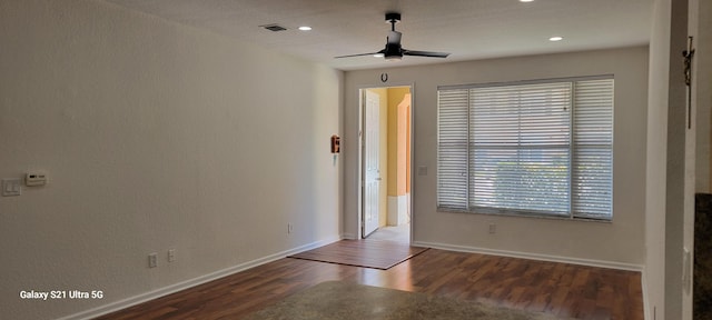 3569 Forest Hill Blvd Unit 103, Palm Springs, FL 33406 - spare room featuring recessed lighting, ceiling fan, visible vents, baseboards, and wood finished floors