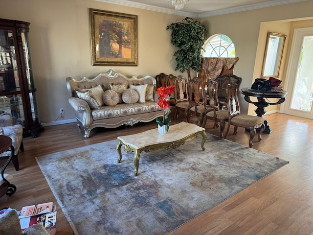 living room featuring crown molding and wood-type flooring