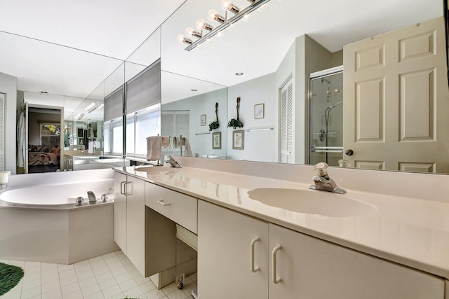 bathroom with tile patterned flooring, vanity, and plus walk in shower