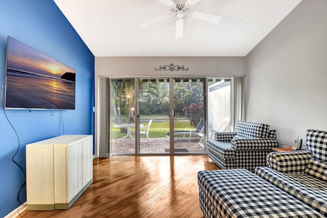 interior space with ceiling fan and wood-type flooring