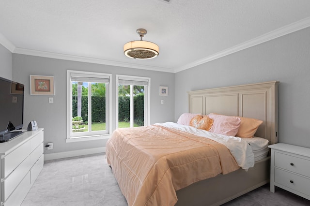 bedroom with crown molding