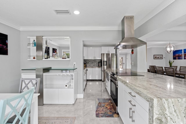 kitchen with electric range, stainless steel refrigerator with ice dispenser, island range hood, white cabinets, and decorative light fixtures