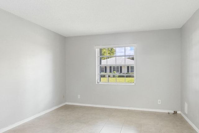 view of tiled empty room