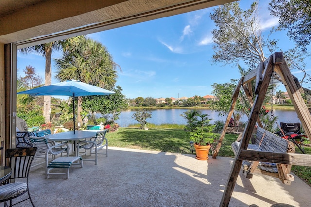 view of patio / terrace with a water view