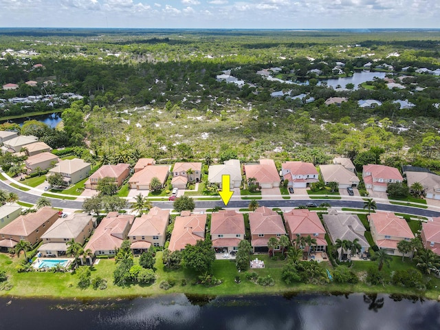 drone / aerial view with a water view