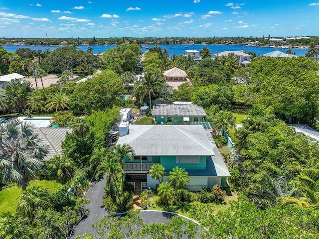 birds eye view of property featuring a water view