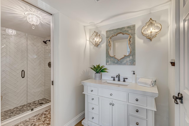 bathroom with vanity and walk in shower