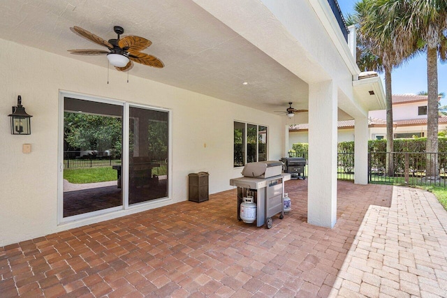 view of patio featuring ceiling fan