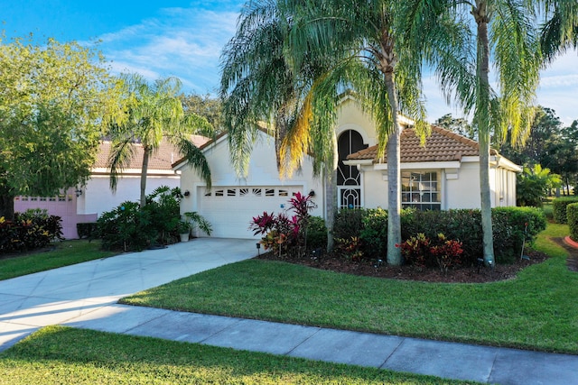 558 SW Saint Georges Bay, Port Saint Lucie, FL 34953 - view of front of house with a garage and a front yard