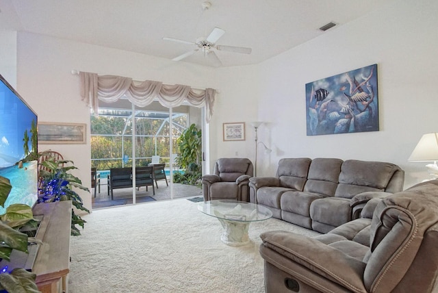 carpeted living room featuring ceiling fan