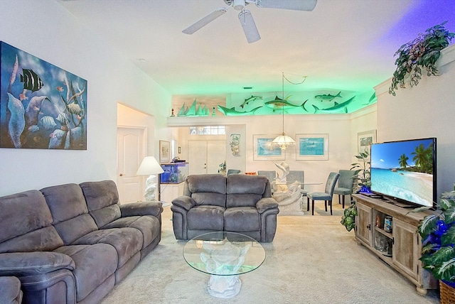 living room with light carpet and ceiling fan