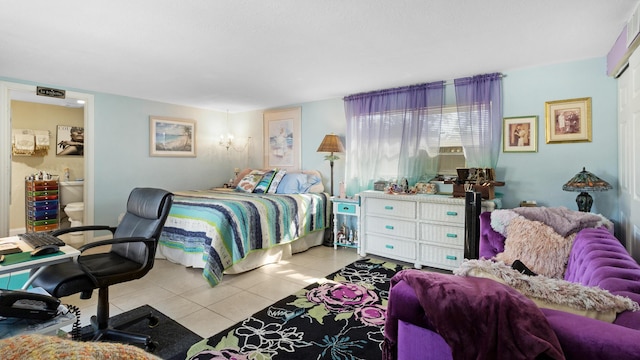 bedroom featuring light tile patterned floors