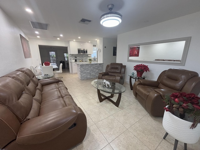 living room featuring light tile patterned floors