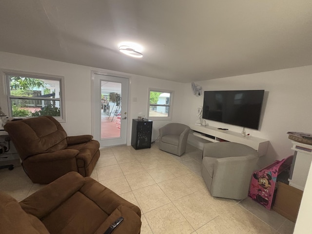 living room with light tile patterned floors