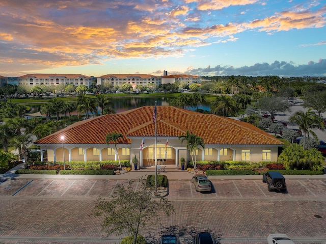 view of front of house featuring a water view