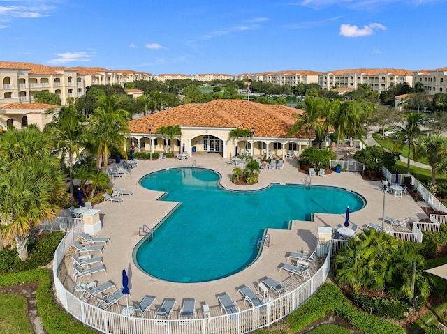 view of swimming pool with a patio area