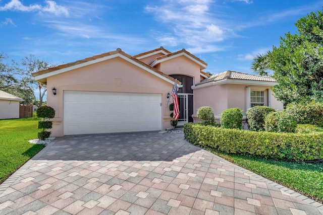 view of front of home with a garage