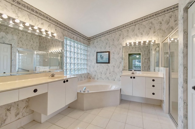 bathroom with vanity, tile patterned floors, and separate shower and tub