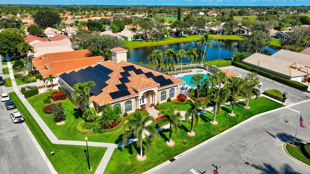 bird's eye view with a water view