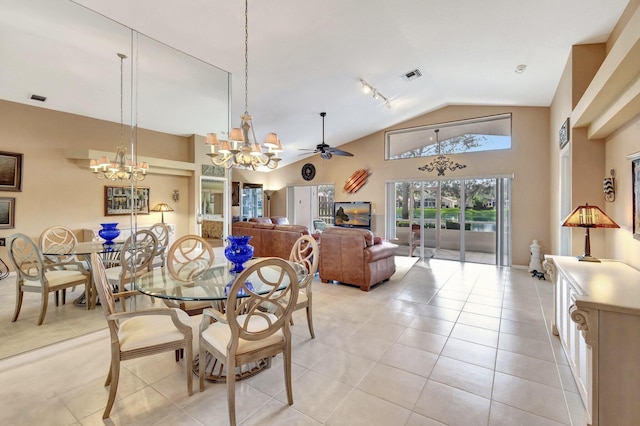 dining area featuring light tile patterned floors, ceiling fan with notable chandelier, and high vaulted ceiling