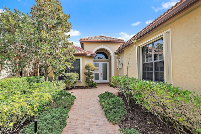 doorway to property with french doors