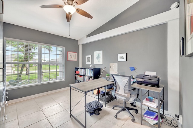 tiled office featuring vaulted ceiling and ceiling fan