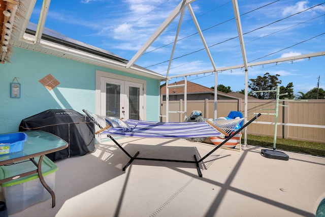 view of patio / terrace featuring grilling area and french doors