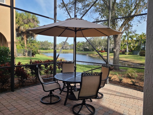 view of patio featuring a water view