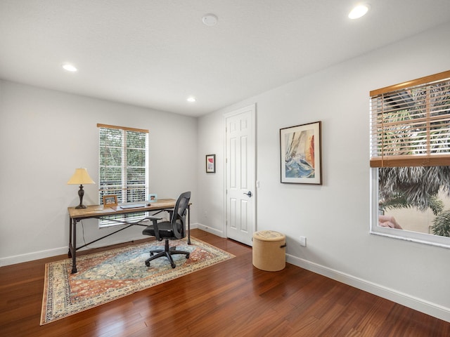 office space featuring dark hardwood / wood-style floors