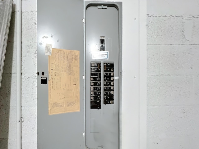 utility room featuring electric panel